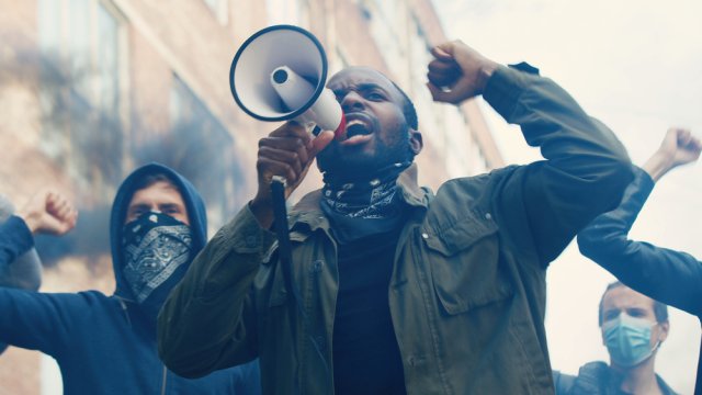 Protester speaking into megaphone