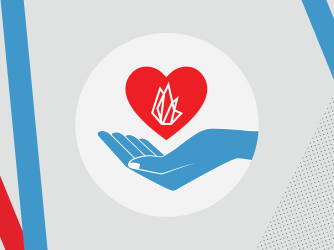 Hand holding a heart with the FIRE logo inside